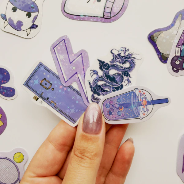 Mor renk temalı yıldız desenli hologram kaplamalı suya dayanıklı 21 adet sticker paketi